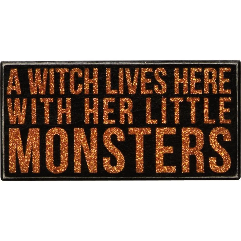 A Witch lives here Halloween Wall Sign