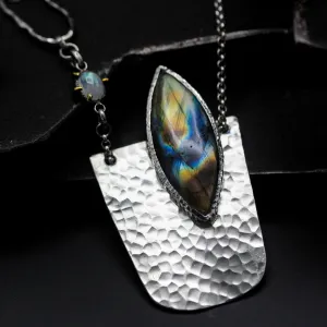 Marquise cabochon labradorite pendant necklace in bezel setting with sterling silver semi-oval shape on silver chain