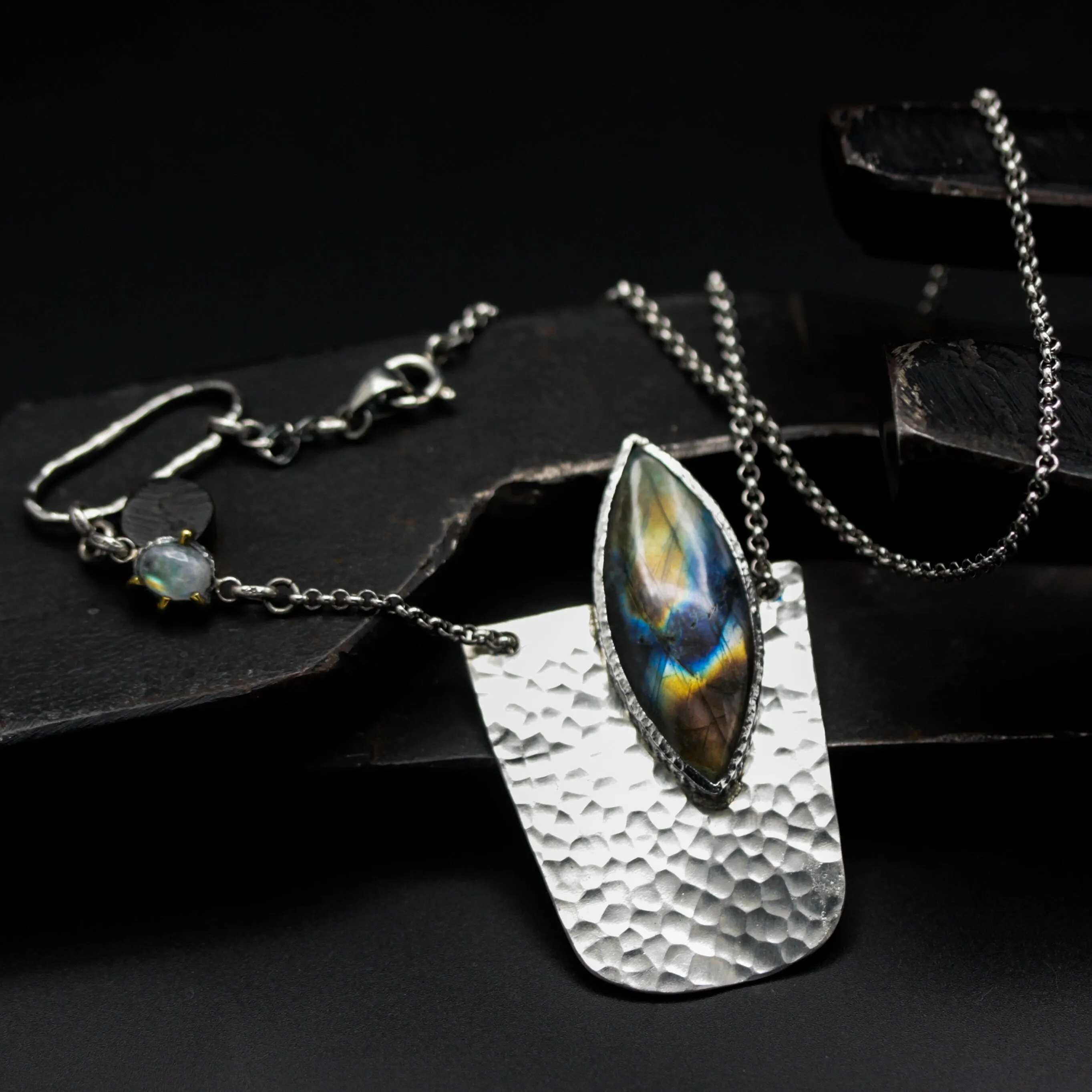 Marquise cabochon labradorite pendant necklace in bezel setting with sterling silver semi-oval shape on silver chain